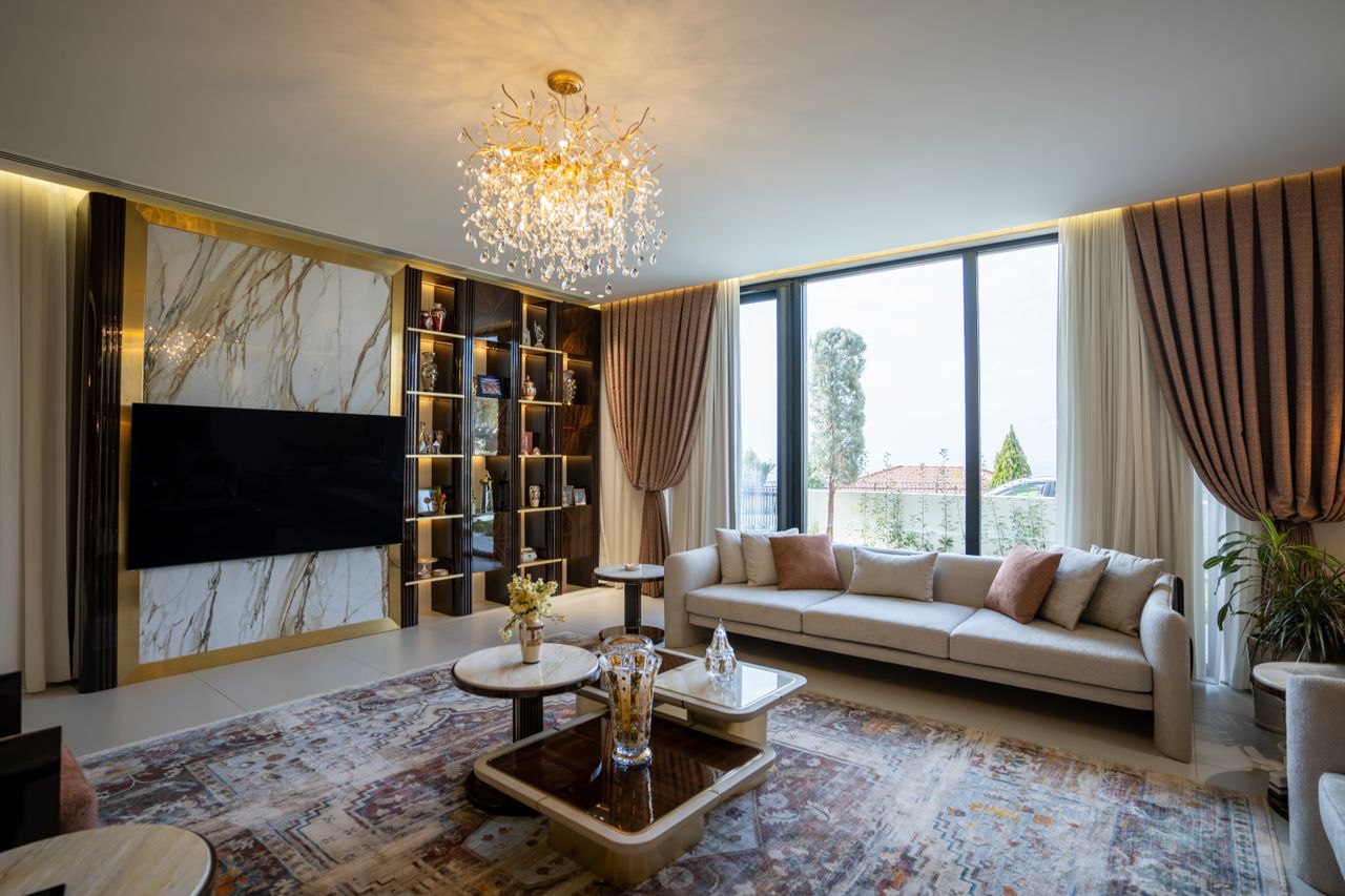 Offerings Luxurious modern living room with chandelier and large windows in Sulaymaniyah, Kurdistan.
